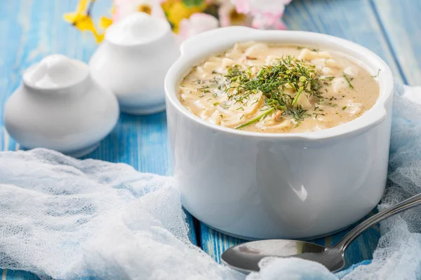 Tasty mushroom soup with noodles on a wooden table. — Stock Photo, Image