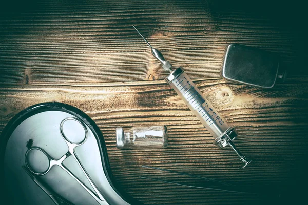 Old medicine equipment on wooden background. — Stock Photo, Image