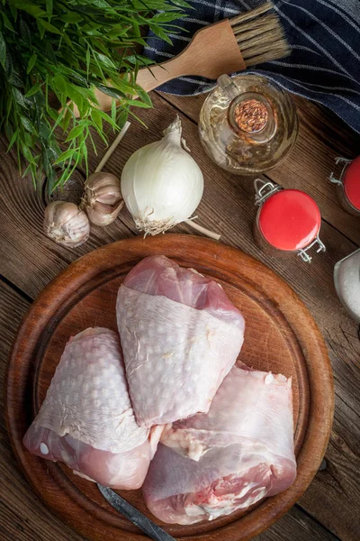 Raw turkey legs on cutting board. — Stock Photo, Image