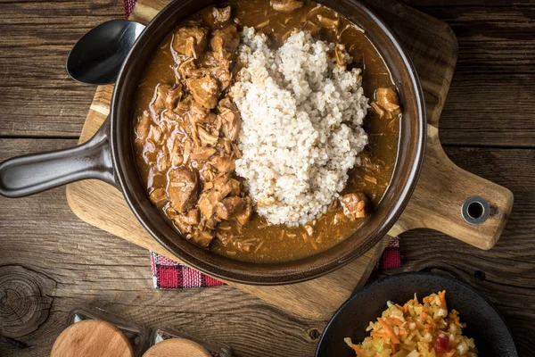 Barley groats with stewed meat. — Stock Photo, Image