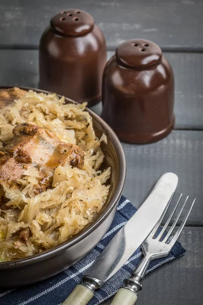 Fried ribs in sauerkraut. — Stock Photo, Image