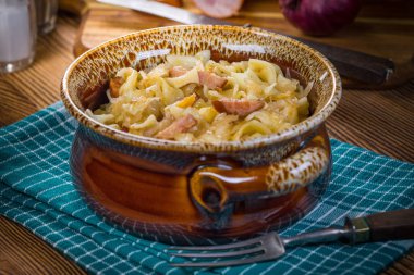 Pasta with sauerkraut and sausage.