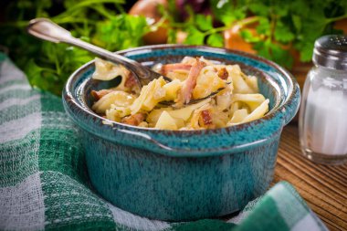 Pasta with sauerkraut and sausage.