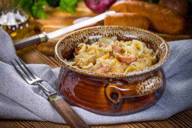 Pasta with sauerkraut and sausage.