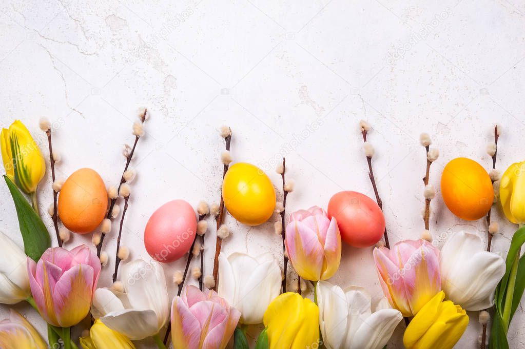 Colorful tulips with Easter eggs 