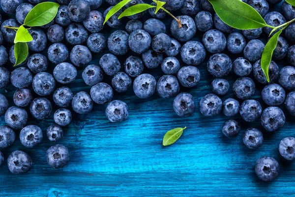 Fresh blueberry on wooden background — Stock Photo, Image