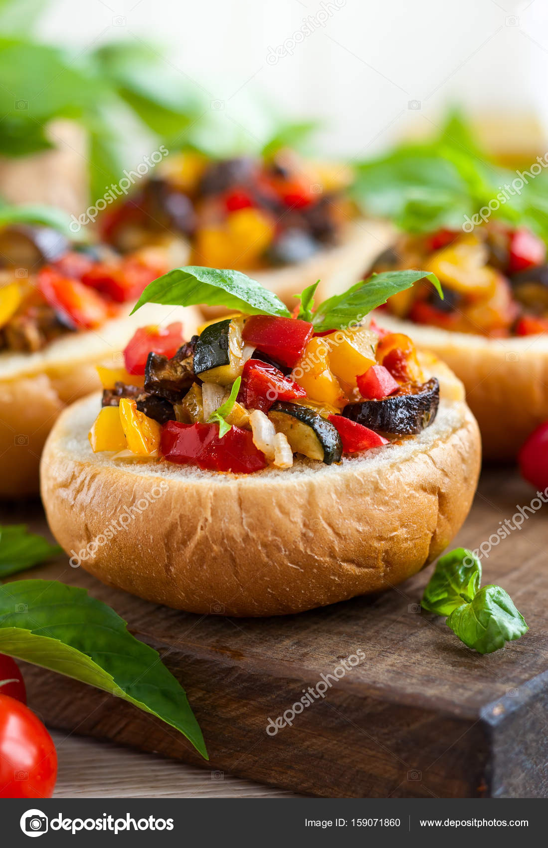 Eggplant caponata in bread bowls Stock Photo by ©sarsmis 159071860