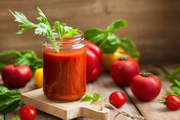 Spicy tomato drink in jars — Stock Photo, Image