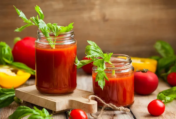 Spicy tomato drink in jars Royalty Free Stock Photos