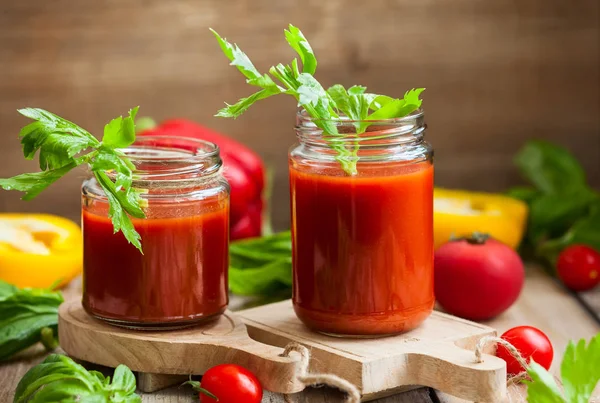 Spicy tomato drink in jars Royalty Free Stock Images