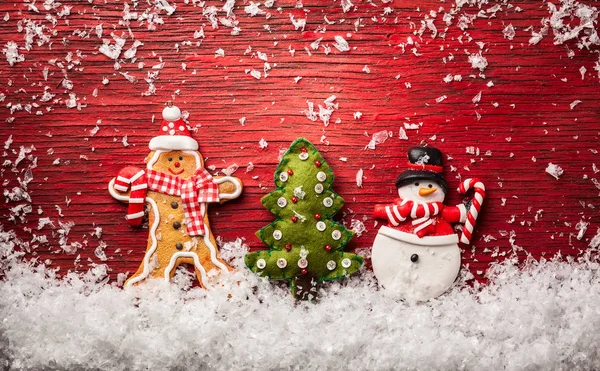 Concetto di Natale con pupazzo di neve, uomo pan di zenzero — Foto Stock