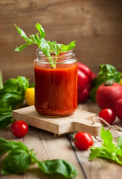 Spicy tomato drink in jars Royalty Free Stock Images