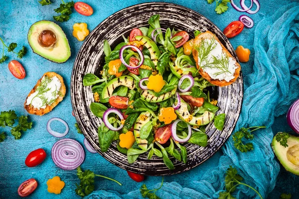 Salad with grilled avocado