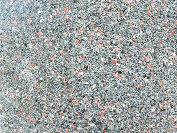 Szorstka faktura czarny i czerwony kamień ściana lub powierzchnia — Zdjęcie stockowe