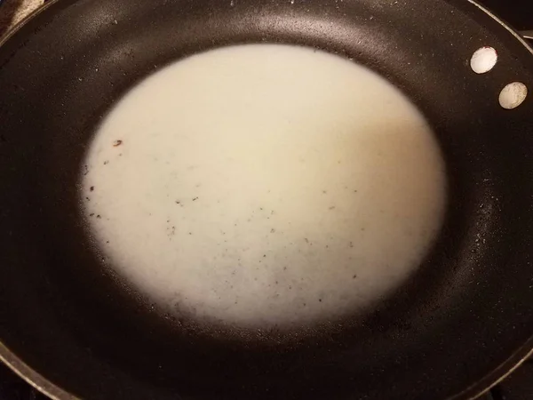 Lard or grease in frying pan or skillet — Stock Photo, Image