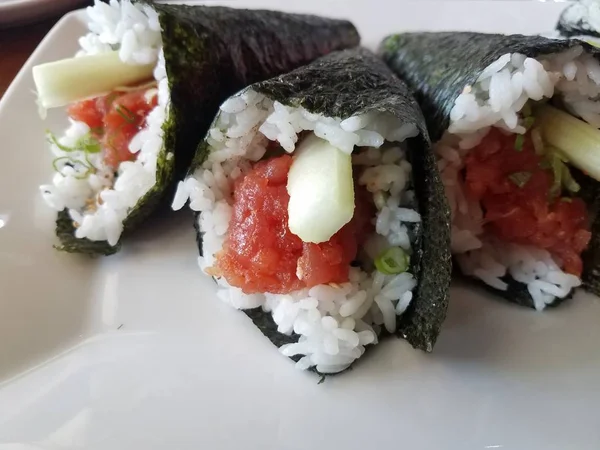 Spicy tuna sushi handrolls with rice and seaweed — Stock Photo, Image