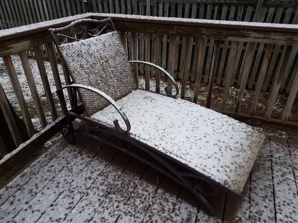 White snow and ice on chair and wood deck or ground — Fotografia de Stock