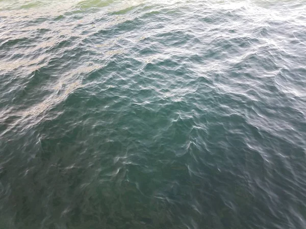 Waves in blue and green water in lake — 스톡 사진