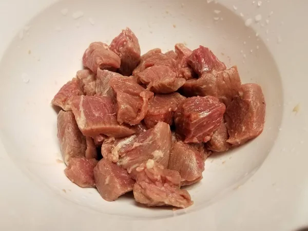 Raw meat beef in white bowl or container — Stok Foto