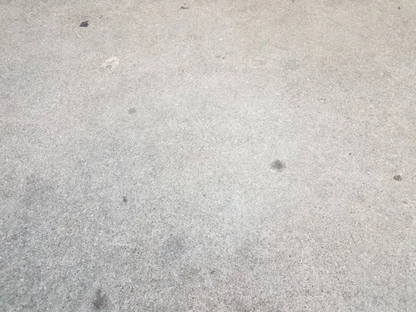 Grey asphalt or ground or surface with stains — Photo
