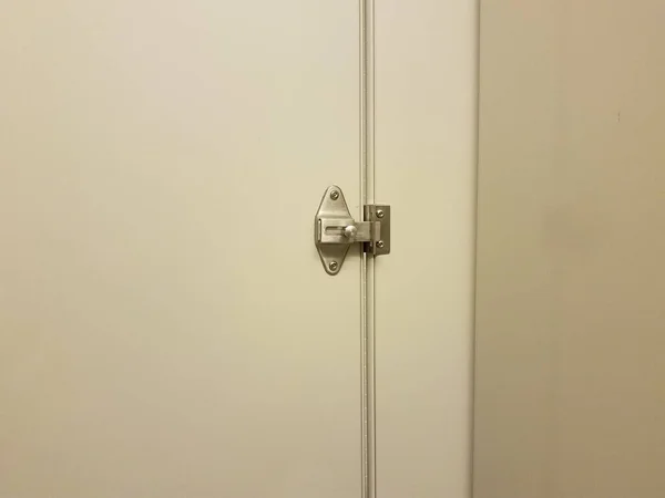 Locked bathroom or restroom stall door or latch — Stock Photo, Image