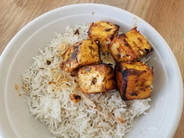 Indian cheese on white rice in bowl — Stock Fotó