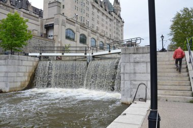 canal or river with waterfall in Ottawa, Canada