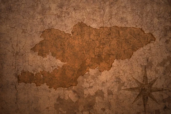 Quirguistão mapa sobre vintage crack papel fundo — Fotografia de Stock