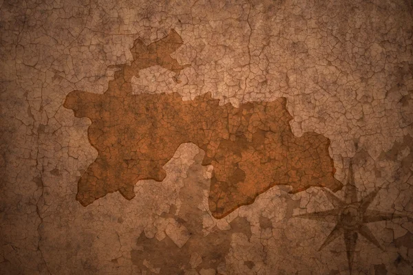 Карта Таджикистана на винтажном фоне из крэка — стоковое фото