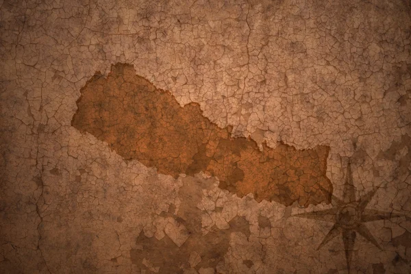 Mapa da Nepal sobre vintage crack fundo de papel — Fotografia de Stock
