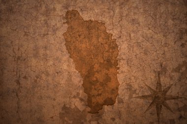 eski vintage çatlamak kağıt arka plan üzerinde Dominika Haritası