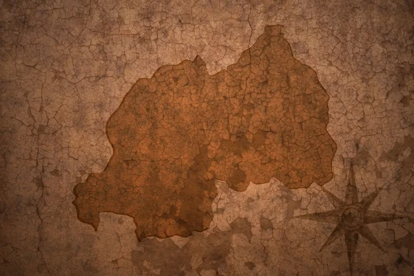 Ruanda mapa em um velho vintage crack papel fundo — Fotografia de Stock