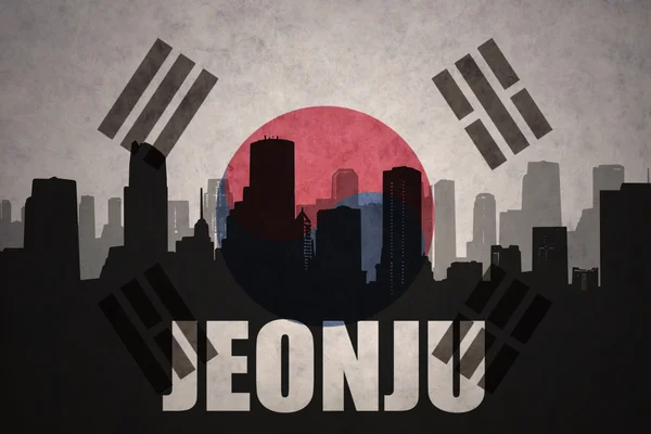 ヴィンテージ韓国の旗の背景にテキストチョンジュと都市の抽象的なシルエット — ストック写真