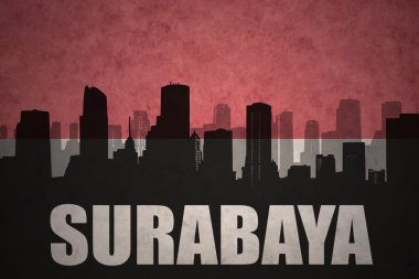 vintage endonezya bayrağı arka planda metin Surabaya ile şehrin soyut siluet