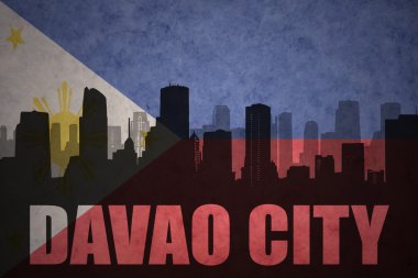 vintage Filipinler bayrak arka planda metin Davao City ile şehrin soyut siluet