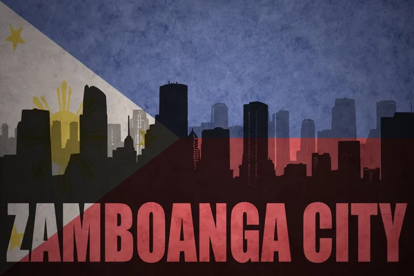 Silueta abstracta de la ciudad con texto Zamboanga City en el fondo de la bandera de Filipinas vintage —  Fotos de Stock