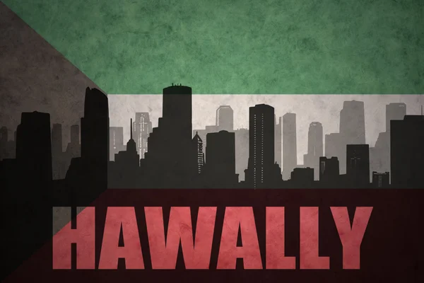 Silueta abstracta de la ciudad con texto Hawally en el fondo de la bandera kuwait vintage — Foto de Stock