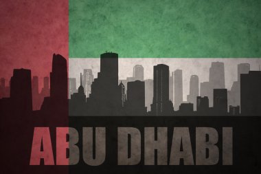 vintage birleşik arap emirlikleri bayrak arka planda metin Abu Dabi ile şehrin soyut siluet