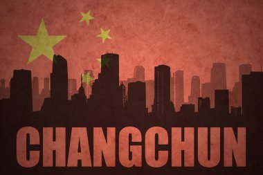 vintage Çin bayrağı arka planda metin Changchun ile şehrin soyut siluet