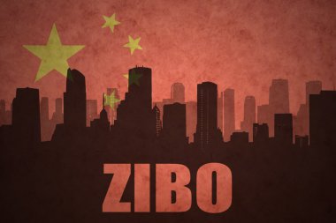 abstract silhouette of the city with text Zibo at the vintage chinese flag background clipart