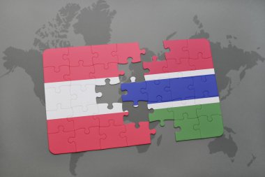 bir dünya haritası arka plan üzerinde Avusturya ve Gambiya ulusal bayrağı ile bulmaca.