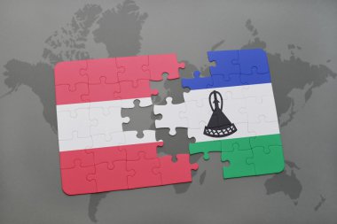 bir dünya haritası arka plan üzerinde avusturya ve lesotho ulusal bayrağı ile bulmaca.