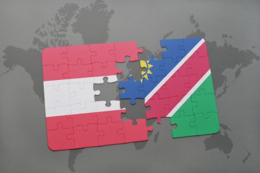 bir dünya haritası arka plan üzerinde avusturya ve namibya ulusal bayrağı ile bulmaca.