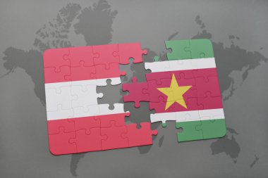 bir dünya haritası arka plan üzerinde avusturya ve surinam ulusal bayrağı ile bulmaca.