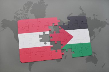 bir dünya haritası arka plan üzerinde Avusturya ve Filistin ulusal bayrağı ile bulmaca.