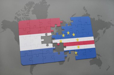 bir dünya haritası arka plan üzerinde Hollanda ve cape verde ulusal bayrağı ile bulmaca.