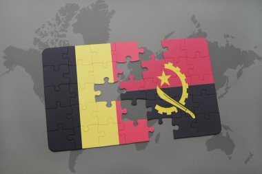 bir dünya haritası arka plan üzerinde Belçika ve angola ulusal bayrağı ile bulmaca.