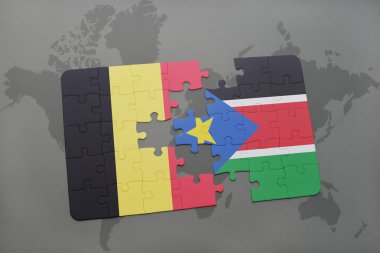 bir dünya haritası arka plan üzerinde Belçika ve güney sudan ulusal bayrağı ile bulmaca.