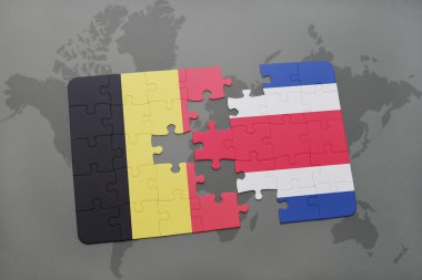 bir dünya haritası arka plan üzerinde Belçika ve Kosta Rika ulusal bayrağı ile bulmaca.