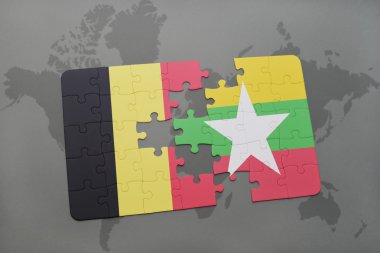 bir dünya haritası arka plan üzerinde Belçika ve Myanmar ulusal bayrağı ile bulmaca.